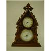 Image 1 : A Late Victorian Desk Timepiece, with barometer and thermometer, in an architectural carved walnu...