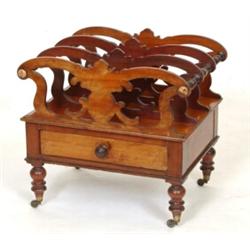 A Victorian Mahogany Canterbury, with four shaped divisions, above a drawer, on turned legs, 51 c...