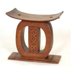 An African Carved and Pierced Stool, 62 cm  See illustration £50 - 80...