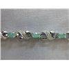 Image 1 : Infinity design - Emerald & Diamond bracelet