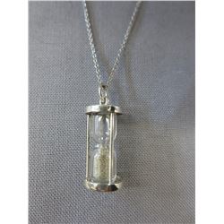 1/2 CT Diamond hourglass necklace - set in silver