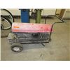Image 1 : Multi fuel shop heater - used
