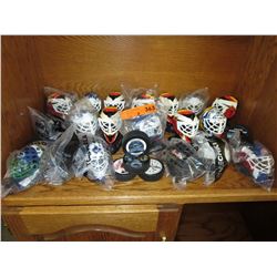 26 Hockey mini masks & pucks