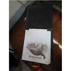 Binder of t-shirt transfers