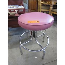 Pink upholstered swivel stool - used