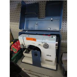 Elna portable sewing machine with case