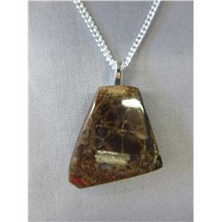 Canadian mined - 43.50 CT Ammolite pendant