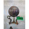 Image 1 : Large polished stone Orb on brass stand