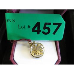 Gold Flake in a gold filled charm container