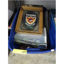 Tote of assorted goods - much of it sports related