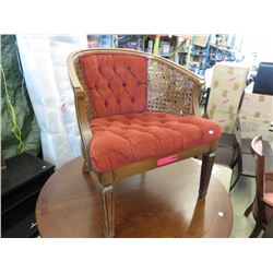 Upholstered tub chair with rattan sides - used