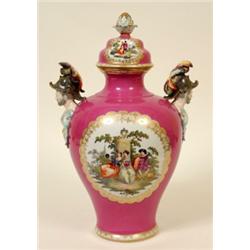 A Late 19th Century Continental Vase and Cover, of baluster form, painted classical figures in a...