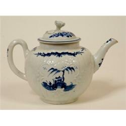 A Late 18th Century Worcester Porcelain Tea Pot, decorated in under glazed blue a fisherman by a...