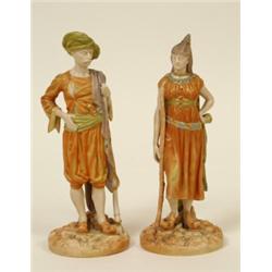 A Pair of  Royal Worcester Burindi Indian Porcelain Figures, modelled by Handley, of a lady and a...