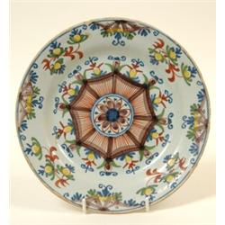 An Ann Gorman Style Delft Polychrome Plate, with floral decoration, 23 cm  See illustration £100...