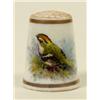 Image 1 : A Royal Worcester Porcelain Thimble, painted a greenfinch by Barker, puce printed mark  See illus...
