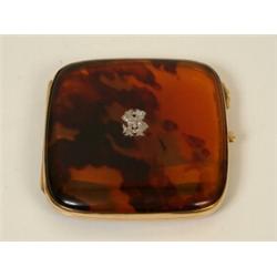 A 9ct Gold and Tortoiseshell Cigarette Case, with a diamond monogram  See illustration £240 - 280...