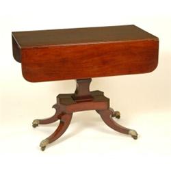 A Late Regency Mahogany Pembroke Table, with one real and one false drawer, with box wood stringi...