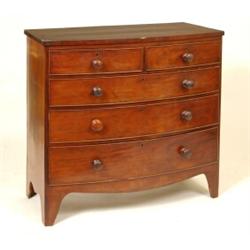 An Early 19th Century Mahogany Bow Front Chest, of two short and three graduated long drawers, 10...