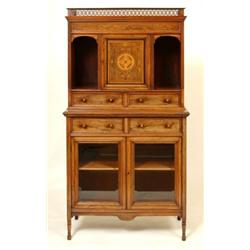A Late Victorian Rosewood Cabinet, with a pierced 3/4 gallery top above a central panel door, fla...