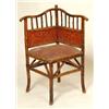 Image 1 : A Late Victorian Bamboo and Ratan Corner Chair...