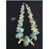 Image 1 : Chunky Turquoise Necklace With Heishi and Hand-carved Shell Fetishes