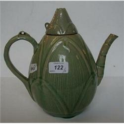 A Celadon Teapot and Cover, in the form of a lotus bud...
