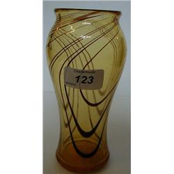 An Amber Glass Vase, with swirl decoration, 18 cm £20 40...