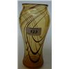 Image 1 : An Amber Glass Vase, with swirl decoration, 18 cm £20 40...