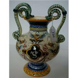 An Italian Maiolica Baluster Vase, with serpent handles, 23 cm £20 30...