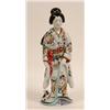 Image 1 : A Kakiemon Style Figure of a Bijin, standing in flowing robes, with enamel decoration, 35 cm  See...