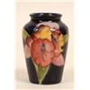 Image 1 : A Moorcroft Orchid Pattern Vase, 9 cm  See illustration £40 60...