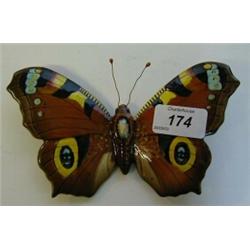 A Beswick Peacock Butterfly Plaque, 1489 (restored) £140 180...