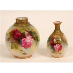 A Royal Worcester Case, decorated roses by Watkins, and a similar vase (2)  See illustration £50...