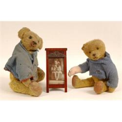 A Photograph of a Girl, dated 1918, holding two plush teddy bears, and the two bears illustrated...