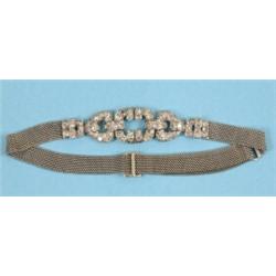 An 18ct White Gold and Diamond Art Deco Bracelet, with buckle set diamonds on a fine mesh strap...