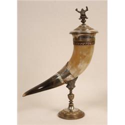 A Horn Cup and Cover, with plated mounts, initialled, with gnome finial, 43 cm  See illustration...