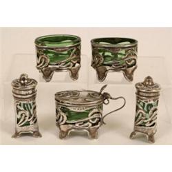 A Set of Art Nouveau Silver Condiments, pierced whiplash, and with green glass liners, Birmingham...