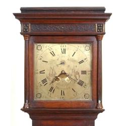 An 18th Century Longcase Clock, the 30 cm square brass dial signed Patrick Russell, Devizes, the...