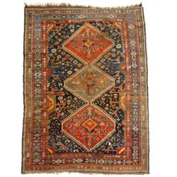 A Caucasian Rug, the ground applied three central medallions, stylised birds and animals, within...