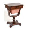 Image 1 : An Early Victorian Rosewood Work Table, having a frieze drawer above a pull out work bag, on balu...