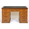 Image 1 : An Edwardian Oak Pedestal Desk, the leatherette inset top above an arrangement of nine drawers, 1...