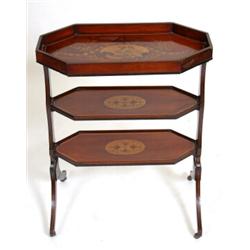 A Late Victorian Three Tier Mahogany Étagère, inlaid with a figure, cornucopia, bell flowers and...
