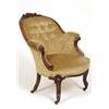 A Victorian Rosewood Button Back Armchair, with carved crest rail, and cabriole front legs  See i...