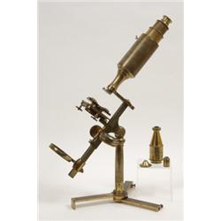 A Victorian Lacquered Brass Monocular Microscope, and various lenses and slides £ 200 - 300...