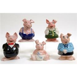 A Group of Wade Nat West Pig Money Banks, (5)  See illustration £ 60 - 100...