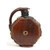 Image 1 : A 19th Century Earthenware Puzzle Jug, decorated in relief flowers, foliage and masks, the octago...