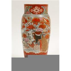 A Kutani Vase, decorated peacocks and pheasants, with underglaze three character mark to the base...