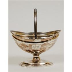 A George III Silver Swing Handle Basket, initialled, London 1794  See illustration £ 150 - 200...