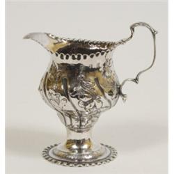 A George III Silver Cream Jug, decorated flowers, London 1770 £ 150 - 200...